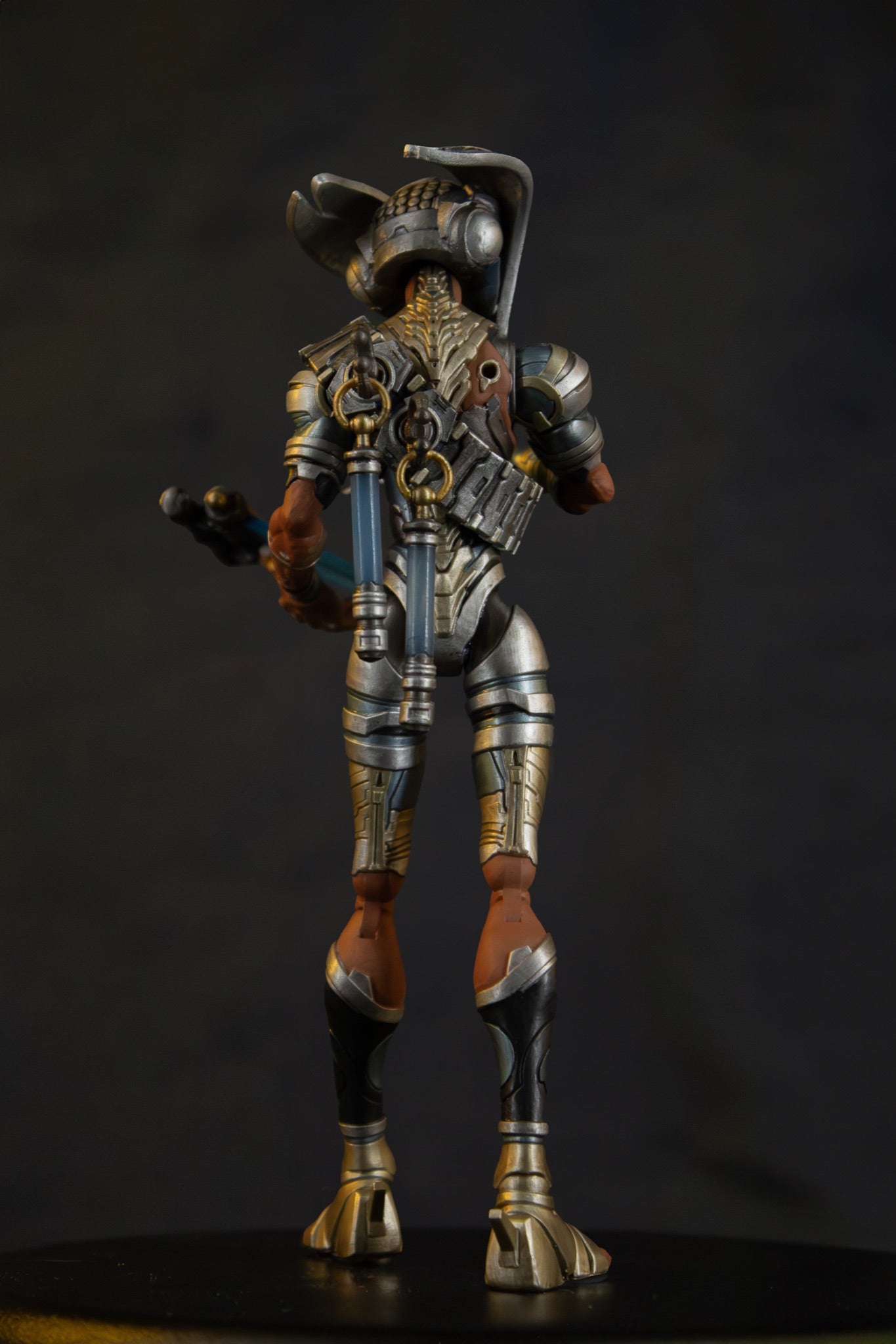 Enoch 7" action figure — back view holding scroll