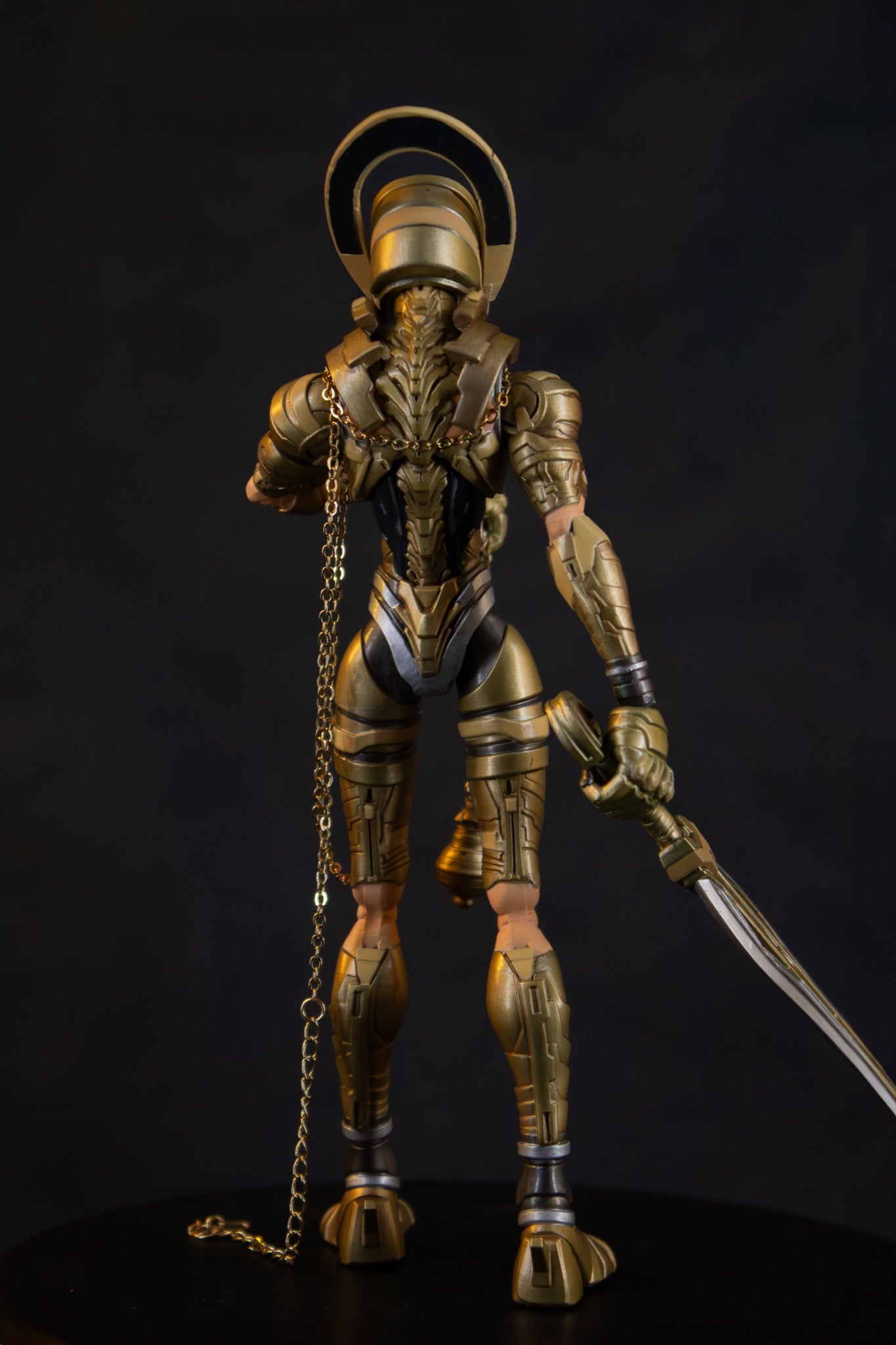 Mikha'el 7" action figure — back view, helmet halo detail