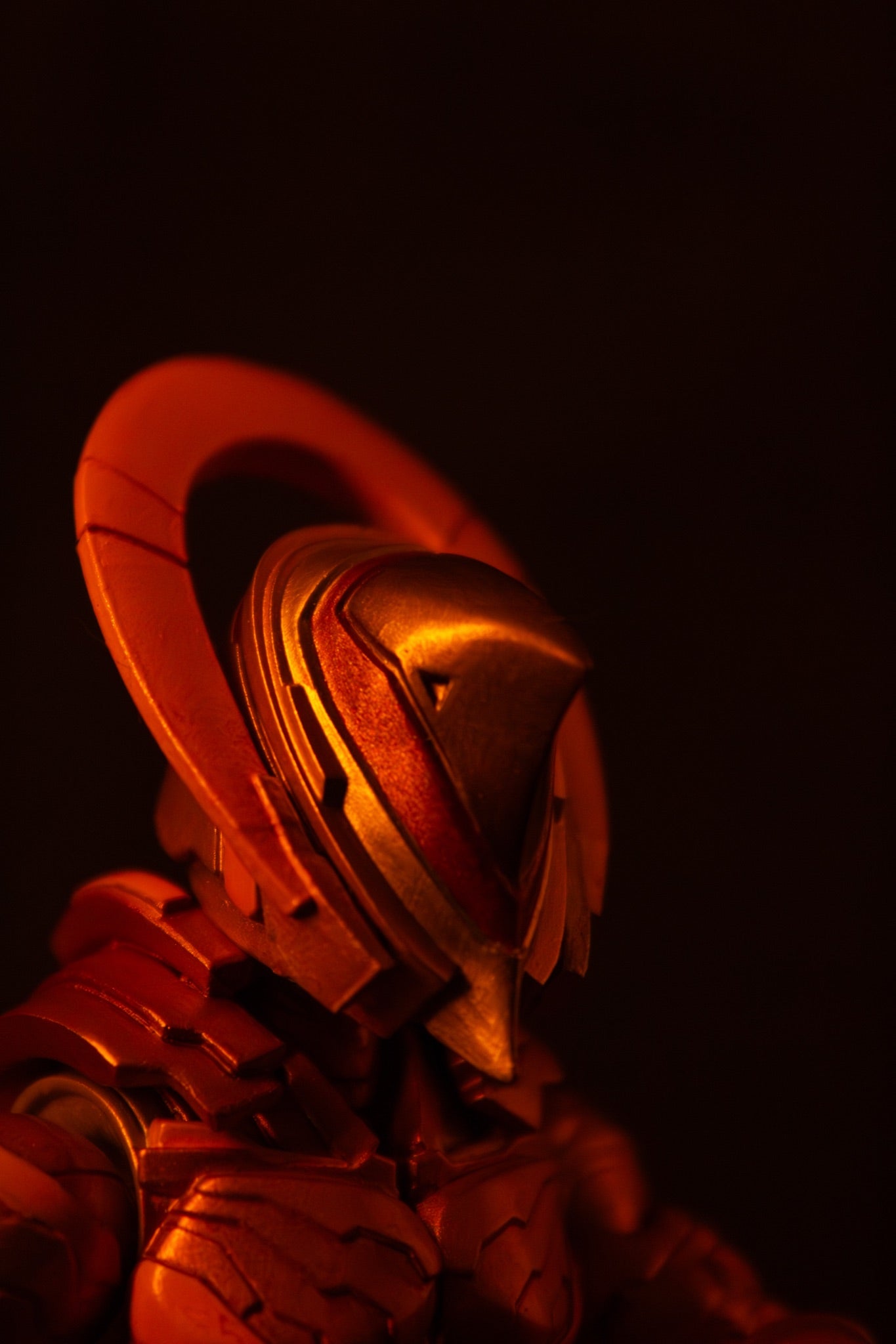 Mikha'el 7" action figure — helmet close-up, red lighting