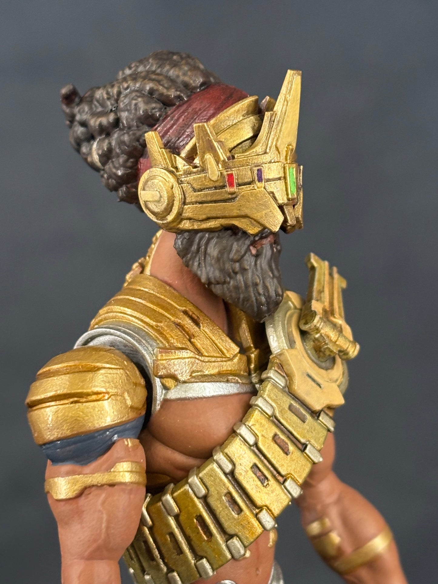 Yeshua 7" action figure — in-hand close-up: chest bandolier