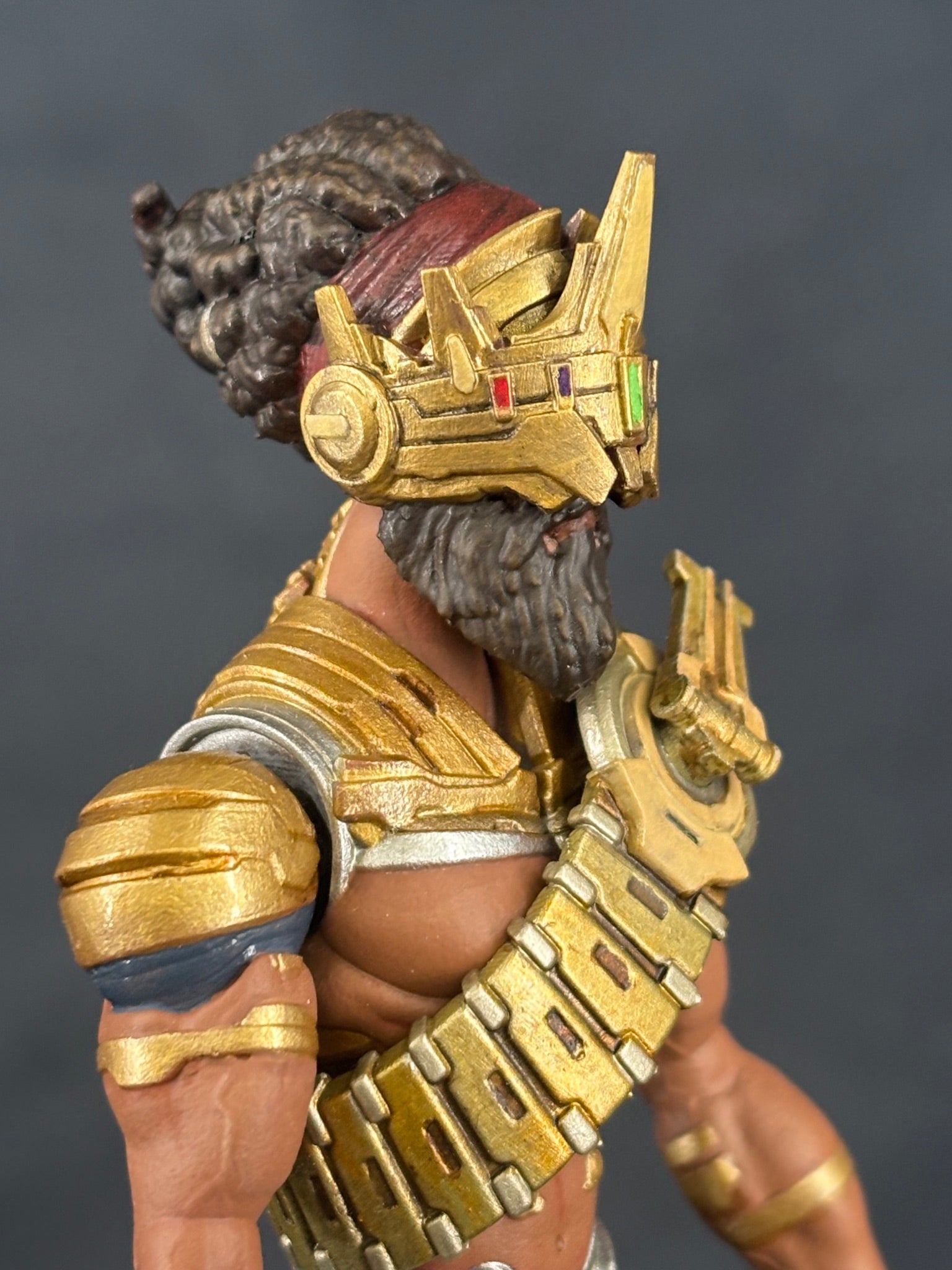 Yeshua 7" action figure — in-hand close-up: chest bandolier