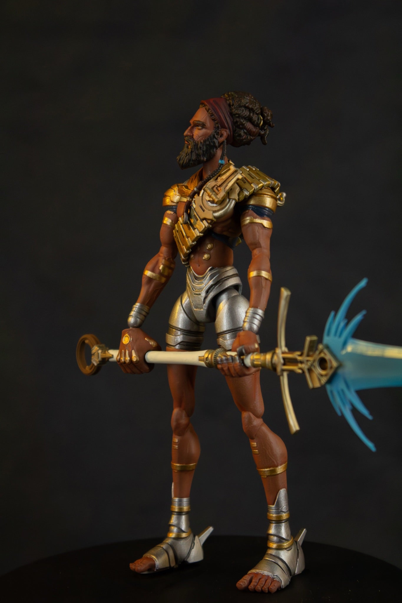Yeshua 7" action figure — side angle, horizontal sword and spear